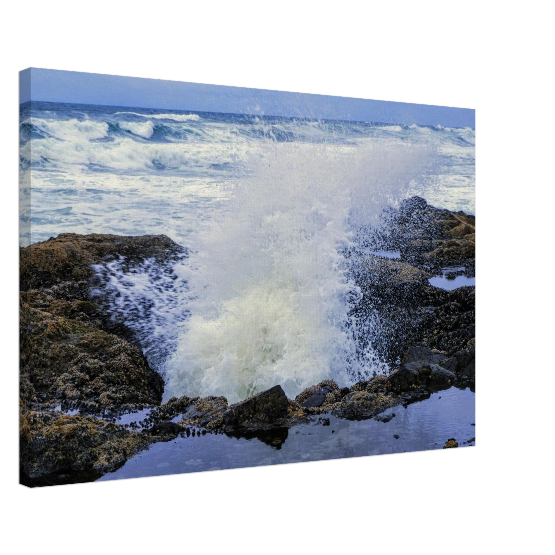 Thor's Well on the Oregon coast with crashing surf and rugged rocks as canvas wall art.