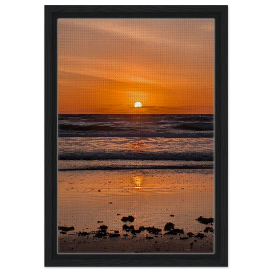 Orange sunrise reflecting across the shoreline at Vilano Beach Florida.