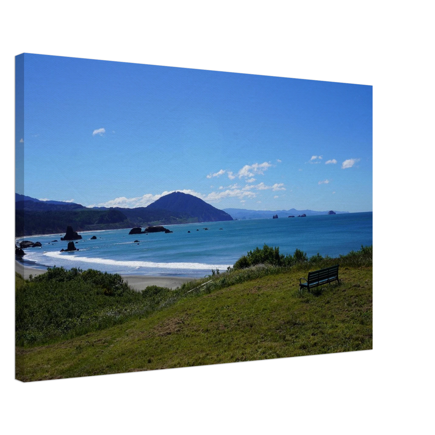 Bench overlooking the Oregon coast with blue Pacific water and distant headlands as canvas wall art.