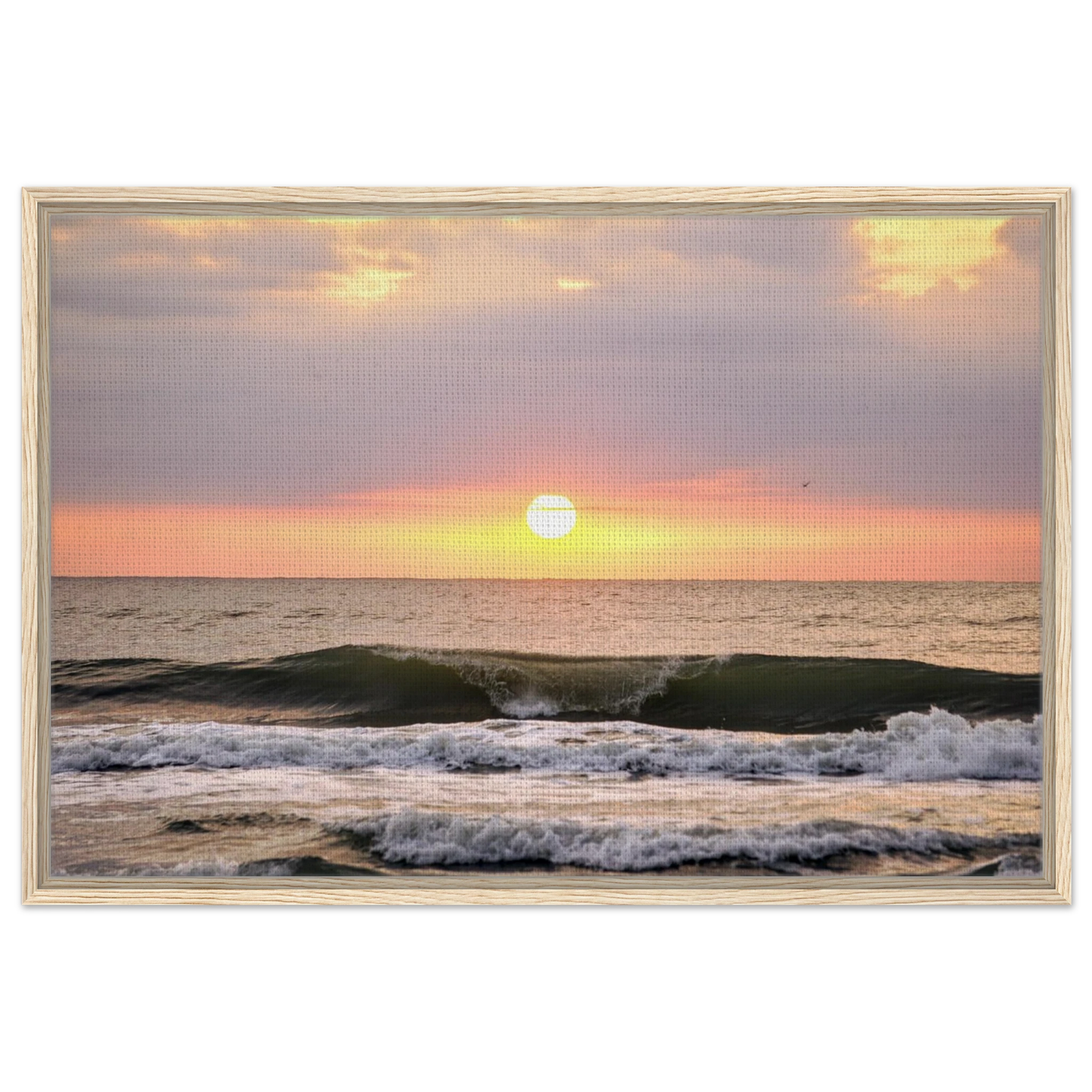 Ocean wave breaking beneath a colorful sunrise at Vilano Beach 