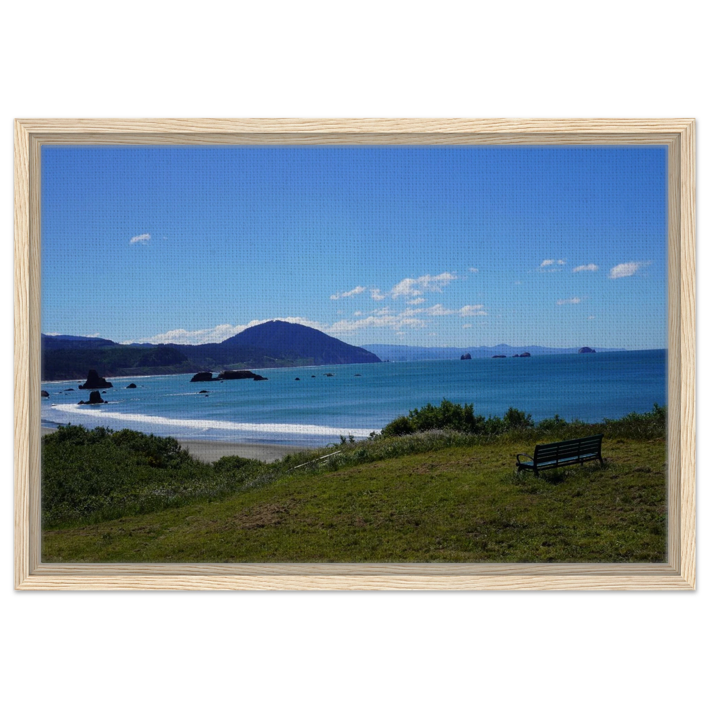 Bench overlooking the Oregon coast with blue Pacific water and distant headlands as canvas wall art.