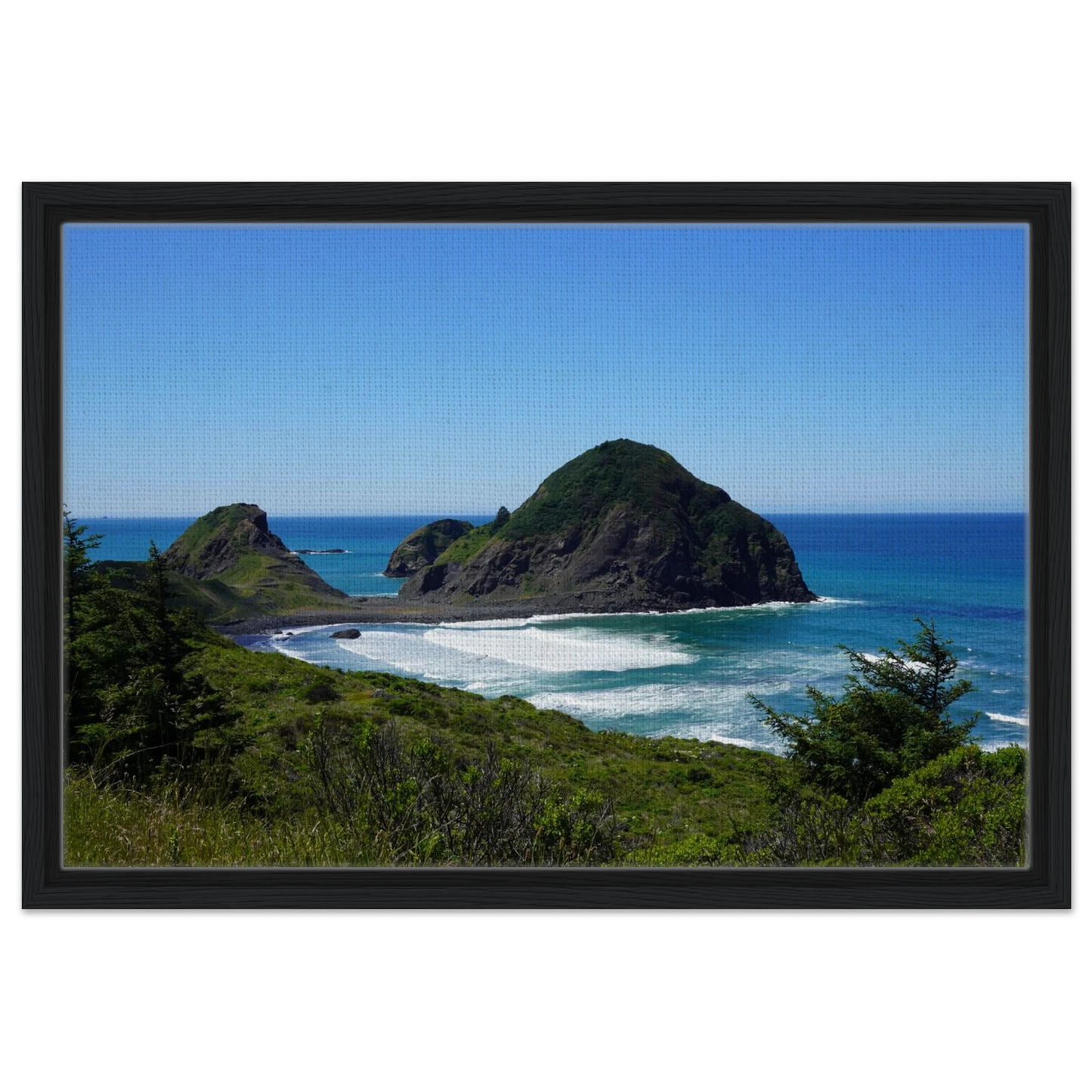 Oregon coast sea stack and blue Pacific shoreline viewed from above as canvas wall art.