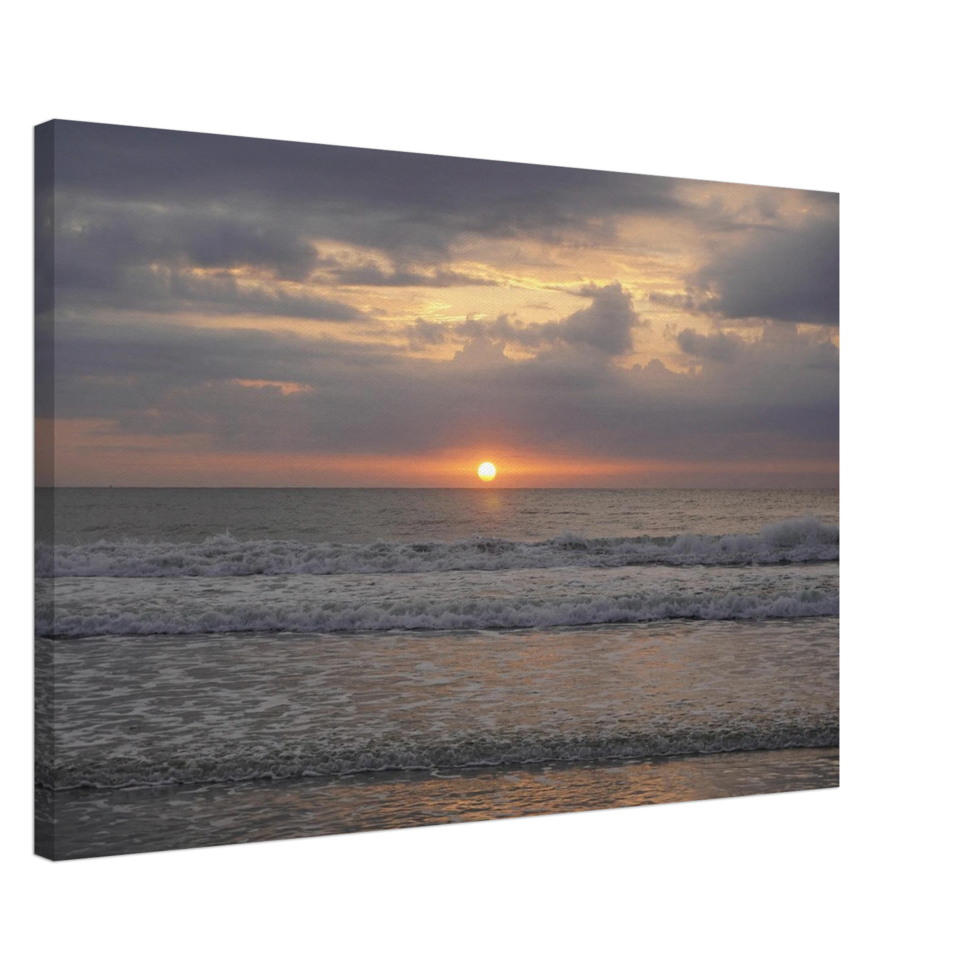 Soft sunrise over the Atlantic Ocean with gentle waves at Vilano Beach Florida.