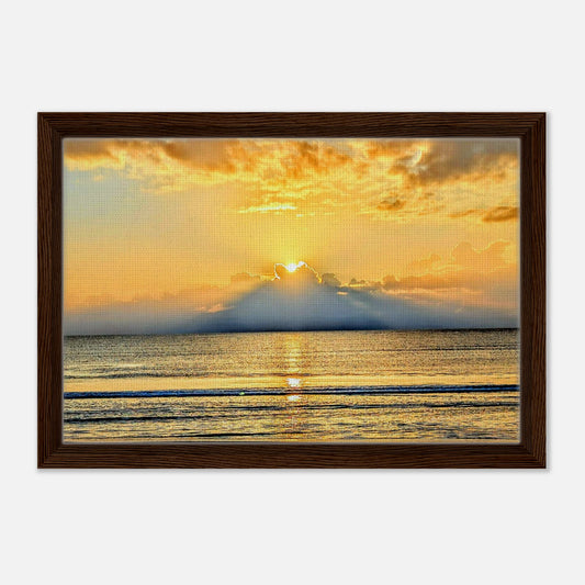 Sun rays breaking through clouds above the Atlantic Ocean at Vilano Beach Florida.