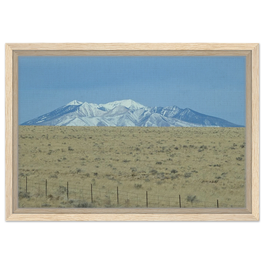 Snow-capped San Francisco Peaks rising above open Arizona plains as premium mountain wall art.