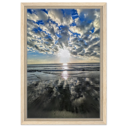 Dramatic clouds reflected across wet sand at Vilano Beach Florida.