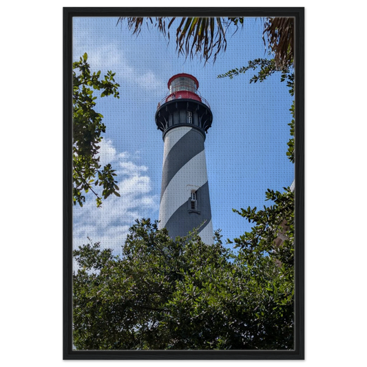 Historic St. Augustine Lighthouse photographed beneath blue Florida skies as premium coastal wall art.
