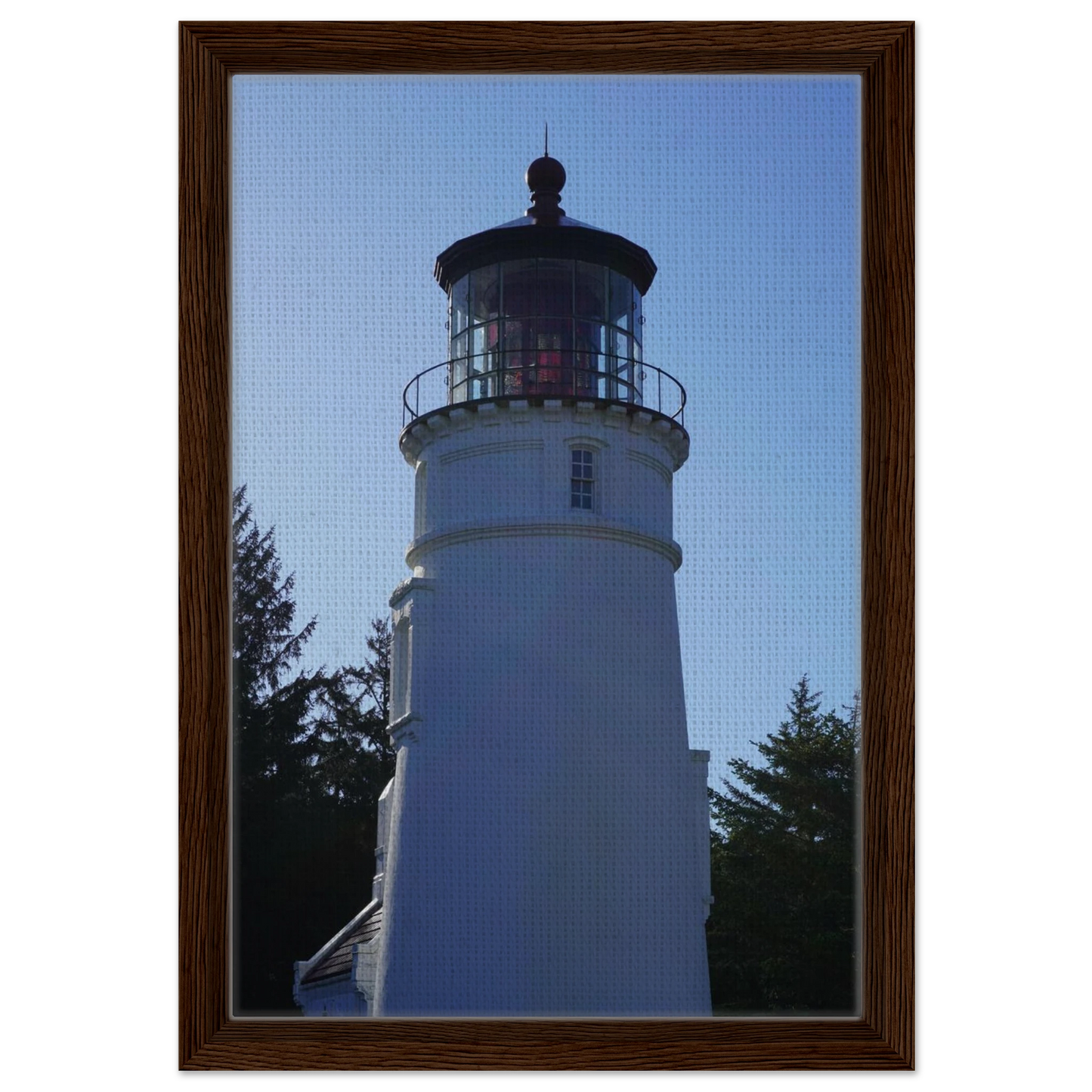 Umpqua River Lighthouse on the Oregon coast beneath a clear blue sky as canvas wall art.